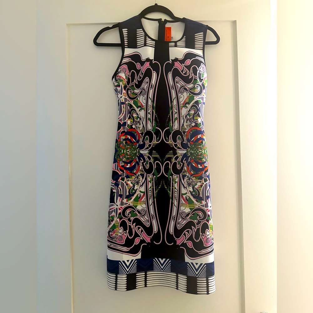 Stylish Clover Canyon dress. Elevate your Wardrobe with this vibrant dress.